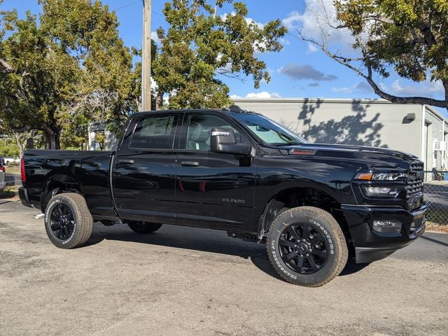 2026 RAM 2500 Big Horn in Diamond Black Crystal Pearlcoat — front three-quarter view