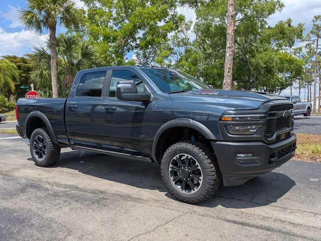 2026 RAM Ram 2500 RAM 2500 REBEL CREW CAB 4X4 6'4' BOX in Forged Blue Metallic Exterior Paint — front three-quarter view