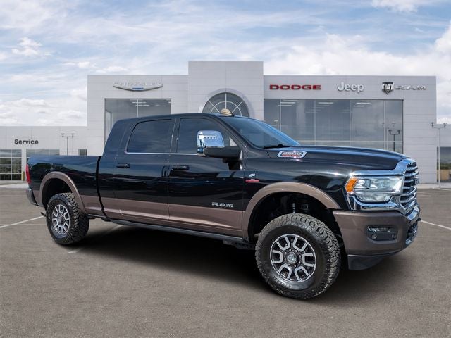 2024 RAM 2500 Limited Longhorn Crew Cab 4x4 8' Box in Diamond Black Crystal Pearlcoat — front three-quarter view