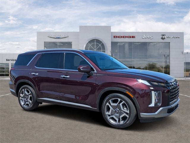 2024 Hyundai Palisade SEL in Sierra Burgundy — front three-quarter view